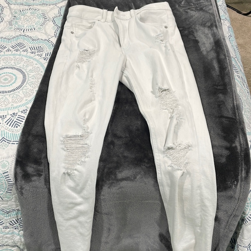 White ripped jeans